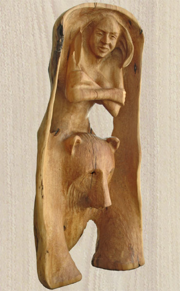 Karhulla ratsastava nainen